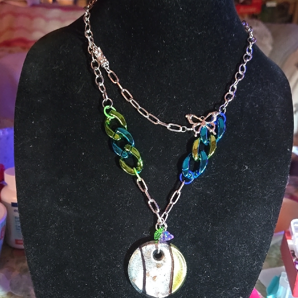 Glass Pendant With A Metal And Acrylic Chain